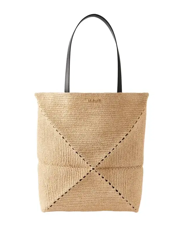 <ul> <li>paula's Ibiza Puzzle Fold Large Leather-trimmed Raffia Tote</li> </ul>