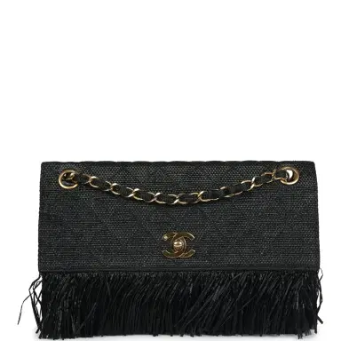 Chanel Vintage Chanel Quilted Fringe Single Flap Bag Black Raffia Gold Hardware | Thumbnail 1 Chanel Vintage Chanel Quilted Fringe Single Flap Bag Black Raffia Gold Hardware | Thumbnail 1