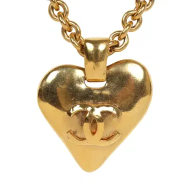 Chanel Vintage Chanel Gold CC Heart Pendant Necklace Gold Hardware | Thumbnail 2 Chanel Vintage Chanel Gold CC Heart Pendant Necklace Gold Hardware | Thumbnail 2