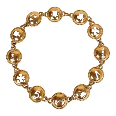Chanel Vintage Chanel Round Cutout Lucky Charms Chain Belt Gold Metal | Thumbnail 1 Chanel Vintage Chanel Round Cutout Lucky Charms Chain Belt Gold Metal | Thumbnail 1