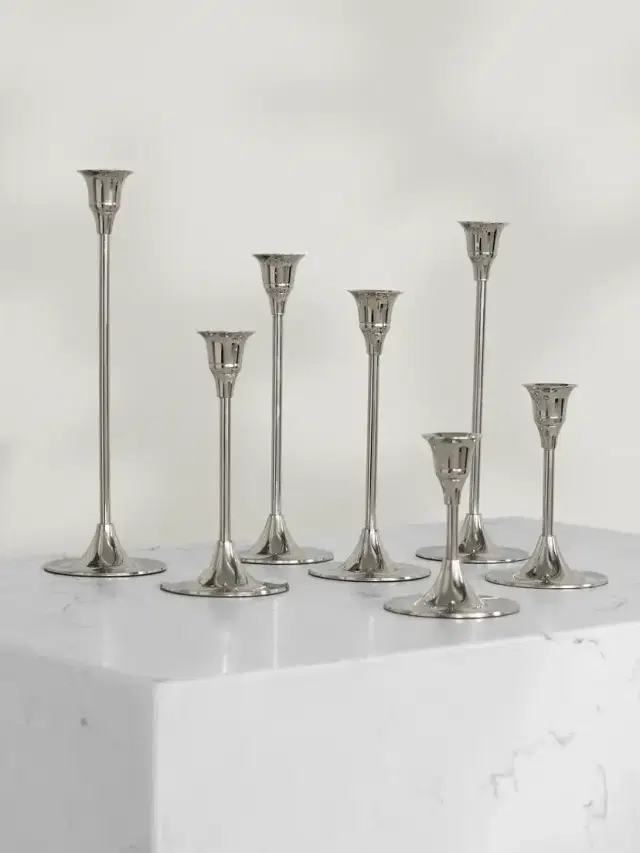 Set Of Seven Nickel Candlesticks