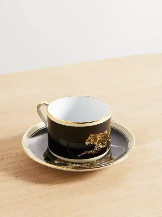 Painted Porcelain Cup And Saucer Set