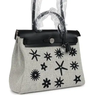 HERMÈS Hermes Herbag Zip 31 PM Hobnailed Black and Ecru Printed H Plume Canvas and Vache Hunter Palladium Hardware | Thumbnail 2 HERMÈS Hermes Herbag Zip 31 PM Hobnailed Black and Ecru Printed H Plume Canvas and Vache Hunter Palladium Hardware | Thumbnail 2