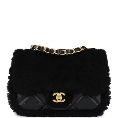 Chanel Chanel Mini Shearling Flap Bag Black Lambskin/Shearling Brushed Gold Hardware | Thumbnail 1 Chanel Chanel Mini Shearling Flap Bag Black Lambskin/Shearling Brushed Gold Hardware | Thumbnail 1