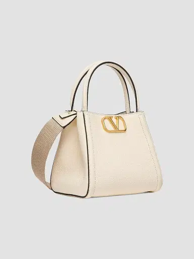 Valentino Garavani Women's Alltime Small Top Handle Bag in Grainy Calfskin - Ivory | Thumbnail 2 Valentino Garavani Women's Alltime Small Top Handle Bag in Grainy Calfskin - Ivory | Thumbnail 2