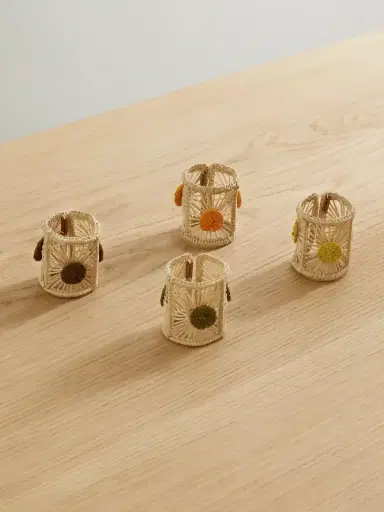 La DoubleJ Set Of Four Raffia Napkin Rings | Thumbnail 1