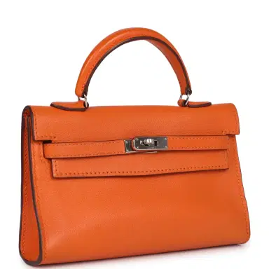 HERMÈS Pre-owned Hermes Micro Kelly 15 Orange Swift Palladium Hardware | Thumbnail 2 HERMÈS Pre-owned Hermes Micro Kelly 15 Orange Swift Palladium Hardware | Thumbnail 2