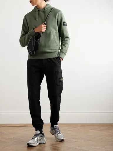 Stone Island Tapered Logo-Appliquéd Garment-Dyed Cotton-Jersey Sweatpants - Men | Thumbnail 2 Stone Island Tapered Logo-Appliquéd Garment-Dyed Cotton-Jersey Sweatpants - Men | Thumbnail 2