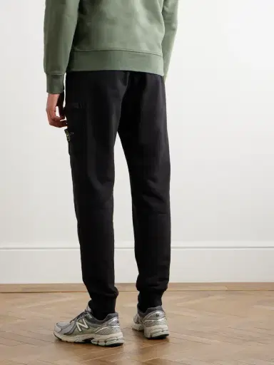 Stone Island Tapered Logo-Appliquéd Garment-Dyed Cotton-Jersey Sweatpants - Men | Thumbnail 3 Stone Island Tapered Logo-Appliquéd Garment-Dyed Cotton-Jersey Sweatpants - Men | Thumbnail 3