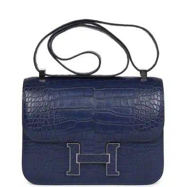 HERMÈS Hermes Constance 1-24 Bleu Saphir Matte Alligator Mississippiensis Marquette Palladium Hardware | Thumbnail 1 HERMÈS Hermes Constance 1-24 Bleu Saphir Matte Alligator Mississippiensis Marquette Palladium Hardware | Thumbnail 1