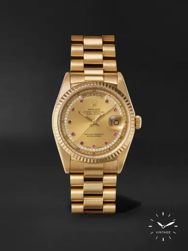Windsor Pre-Owned 1990 Rolex Oyster Perpetual Day-Date Automatic 36mm 18-Karat Gold, Diamond and Ruby Watch, Ref. No. 18238 - Men | Thumbnail 1 Windsor Pre-Owned 1990 Rolex Oyster Perpetual Day-Date Automatic 36mm 18-Karat Gold, Diamond and Ruby Watch, Ref. No. 18238 - Men | Thumbnail 1