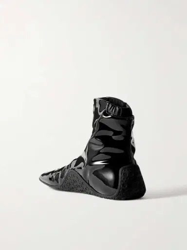 Alaïa Glossed Ankle Boots | Thumbnail 3