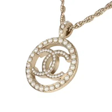 Chanel Chanel Round CC Pearl Pendant Necklace Faux Pearls & Light Gold Tone Hardware | Thumbnail 4 Chanel Chanel Round CC Pearl Pendant Necklace Faux Pearls & Light Gold Tone Hardware | Thumbnail 4
