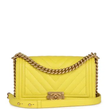 Chanel Chanel Medium Chevron Boy Bag Yellow Grained Calfskin Brushed Gold Hardware | Thumbnail 1 Chanel Chanel Medium Chevron Boy Bag Yellow Grained Calfskin Brushed Gold Hardware | Thumbnail 1
