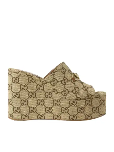 Gucci Carmen Horsebit-embellished Canvas-jacquard Wedge Mules | Thumbnail 1 Gucci Carmen Horsebit-embellished Canvas-jacquard Wedge Mules | Thumbnail 1