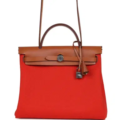 HERMÈS Hermes Herbag Zip PM 31 Capucine Toile Militaire & Fauve Vache Hunter Palladium Hardware | Thumbnail 1 HERMÈS Hermes Herbag Zip PM 31 Capucine Toile Militaire & Fauve Vache Hunter Palladium Hardware | Thumbnail 1