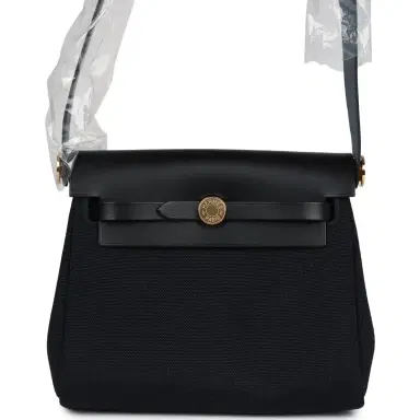 HERMÈS Hermes Herbag Zip 20 Mini Black Toile Militaire Canvas and Black Vache Hunter Gold Hardware | Thumbnail 1 HERMÈS Hermes Herbag Zip 20 Mini Black Toile Militaire Canvas and Black Vache Hunter Gold Hardware | Thumbnail 1