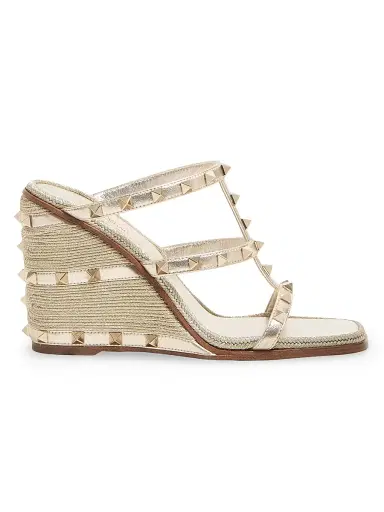 Valentino Garavani Women's Rockstud Wedge Sandals in Laminated Nappa | Thumbnail 1 Valentino Garavani Women's Rockstud Wedge Sandals in Laminated Nappa | Thumbnail 1