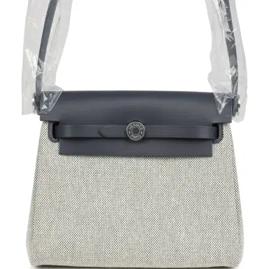 HERMÈS Hermes Herbag Zip 20 Mini Ecru and Ardoise Toile H Canvas and Ardoise Vache Hunter Palladium Hardware | Thumbnail 1 HERMÈS Hermes Herbag Zip 20 Mini Ecru and Ardoise Toile H Canvas and Ardoise Vache Hunter Palladium Hardware | Thumbnail 1