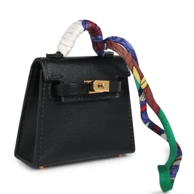 HERMÈS Hermes Mini Kelly Twilly Bag Charm Black Tadelakt Gold Hardware | Thumbnail 2 HERMÈS Hermes Mini Kelly Twilly Bag Charm Black Tadelakt Gold Hardware | Thumbnail 2