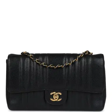 Chanel Vintage Chanel Medium Vertical Flap Bag Black Caviar Gold Hardware | Thumbnail 1 Chanel Vintage Chanel Medium Vertical Flap Bag Black Caviar Gold Hardware | Thumbnail 1