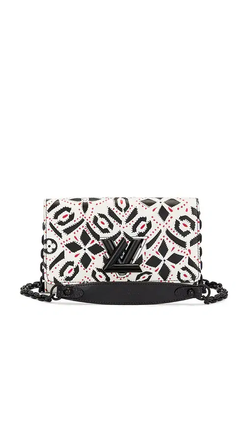 FWRD Renew Louis Vuitton Portefeuille Twisted Wallet On Chain
