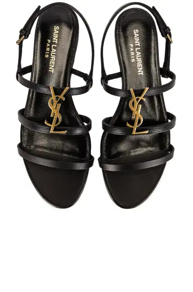Saint Laurent Cassandra Leather Flat Sandals | Thumbnail 1 Saint Laurent Cassandra Leather Flat Sandals | Thumbnail 1