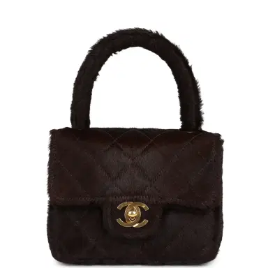 Chanel Vintage Chanel Micro Kelly Child Dark Brown Pony Hair Gold Hardware | Thumbnail 1 Chanel Vintage Chanel Micro Kelly Child Dark Brown Pony Hair Gold Hardware | Thumbnail 1