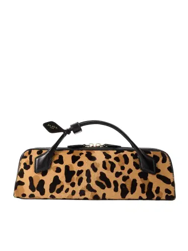 Alaïa Le Teckel Leather-trimmed Leopard-print Calf Hair Clutch | Thumbnail 1 Alaïa Le Teckel Leather-trimmed Leopard-print Calf Hair Clutch | Thumbnail 1