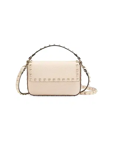 Valentino Garavani Women's Rockstud Grainy Calfskin Pouch - Light Ivory | Thumbnail 1 Valentino Garavani Women's Rockstud Grainy Calfskin Pouch - Light Ivory | Thumbnail 1