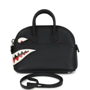 HERMÈS Hermes Mini Bolide Shark Bag Charm Black and White Swift Palladium Hardware | Thumbnail 1 HERMÈS Hermes Mini Bolide Shark Bag Charm Black and White Swift Palladium Hardware | Thumbnail 1