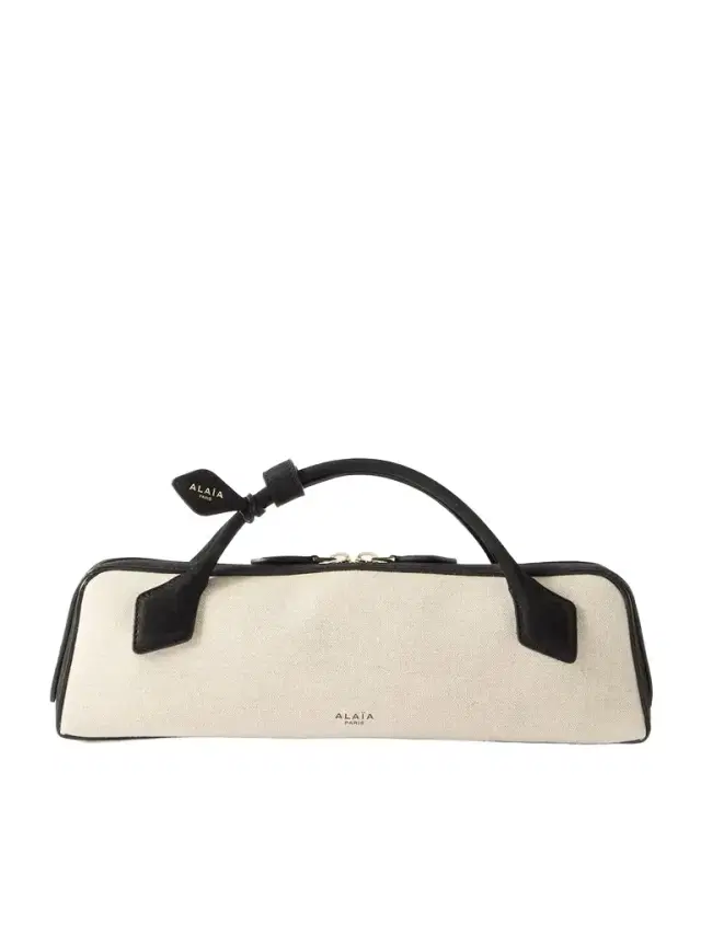 Le Teckel Leather-trimmed Canvas Clutch