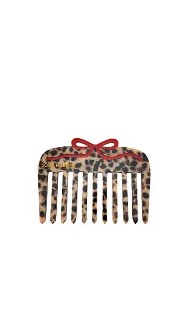 Solar Eclipse Hand-painted Leopard Bow Pocket Hair Comb | Thumbnail 1 Solar Eclipse Hand-painted Leopard Bow Pocket Hair Comb | Thumbnail 1