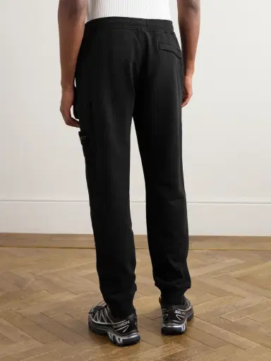 Stone Island Tapered Logo-Appliquéd Organic Cotton-Jersey Sweatpants - Men | Thumbnail 4 Stone Island Tapered Logo-Appliquéd Organic Cotton-Jersey Sweatpants - Men | Thumbnail 4
