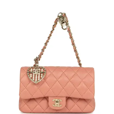 Chanel Chanel Nano Classic Double Flap Bag Charm Pink Lambskin Light Gold Hardware | Thumbnail 1 Chanel Chanel Nano Classic Double Flap Bag Charm Pink Lambskin Light Gold Hardware | Thumbnail 1