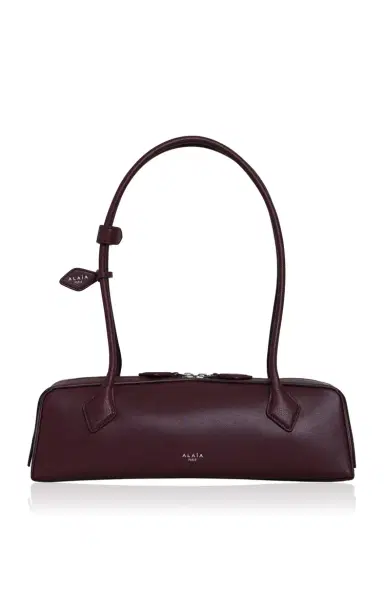 ALAÏA Le Teckel Medium Leather Shoulder Bag - Burgundy - OS | Thumbnail 1 ALAÏA Le Teckel Medium Leather Shoulder Bag - Burgundy - OS | Thumbnail 1