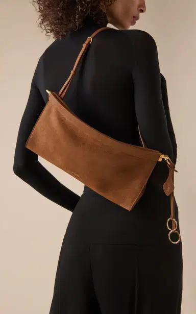 Alaïa Le Click Medium Suede E/W Shoulder Bag | Thumbnail 2 Alaïa Le Click Medium Suede E/W Shoulder Bag | Thumbnail 2