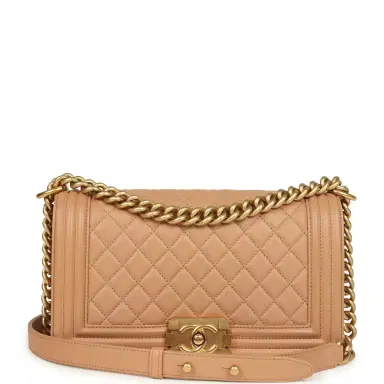Chanel Preowned Chanel Medium Boy Bag Dark Beige Lambskin Antique Gold Hardware | Thumbnail 1 Chanel Preowned Chanel Medium Boy Bag Dark Beige Lambskin Antique Gold Hardware | Thumbnail 1