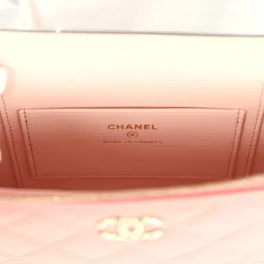 Chanel Chanel Flower Top Handle Long Vanity Case with Chain Pink Lambskin Light Gold Hardware | Thumbnail 11 Chanel Chanel Flower Top Handle Long Vanity Case with Chain Pink Lambskin Light Gold Hardware | Thumbnail 11