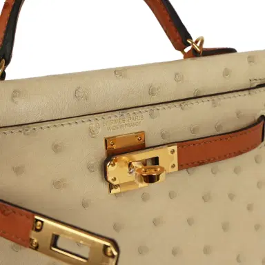 HERMÈS Hermes Special Order (HSS) Kelly Sellier 20 Parchemin and Cognac Ostrich Gold Hardware | Thumbnail 7 HERMÈS Hermes Special Order (HSS) Kelly Sellier 20 Parchemin and Cognac Ostrich Gold Hardware | Thumbnail 7