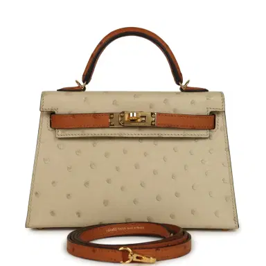 HERMÈS Hermes Special Order (HSS) Kelly Sellier 20 Parchemin and Cognac Ostrich Gold Hardware | Thumbnail 1 HERMÈS Hermes Special Order (HSS) Kelly Sellier 20 Parchemin and Cognac Ostrich Gold Hardware | Thumbnail 1