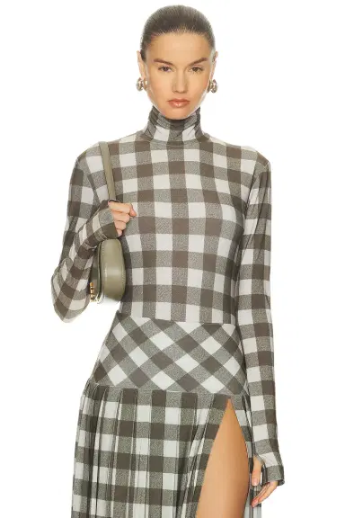 Norma Kamali Slim Fit Long Sleeve Turtleneck Top | Thumbnail 1 Norma Kamali Slim Fit Long Sleeve Turtleneck Top | Thumbnail 1