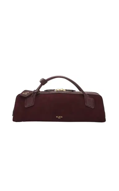 Alaïa Le Teckel Leather Clutch | Thumbnail 1 Alaïa Le Teckel Leather Clutch | Thumbnail 1