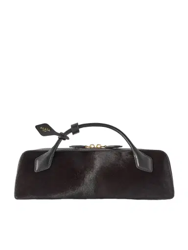 Alaïa Le Teckel Leather-trimmed Calf Hair Clutch | Thumbnail 1 Alaïa Le Teckel Leather-trimmed Calf Hair Clutch | Thumbnail 1