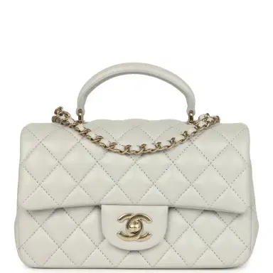Chanel Chanel Mini Rectangular Flap Bag with Top Handle Light Grey Lambskin Light Gold Hardware | Thumbnail 1 Chanel Chanel Mini Rectangular Flap Bag with Top Handle Light Grey Lambskin Light Gold Hardware | Thumbnail 1