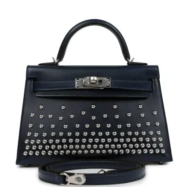 HERMÈS Hermes Kelly Sellier 20 Clouté Bleu Abyss Box Palladium Hardware | Thumbnail 1 HERMÈS Hermes Kelly Sellier 20 Clouté Bleu Abyss Box Palladium Hardware | Thumbnail 1