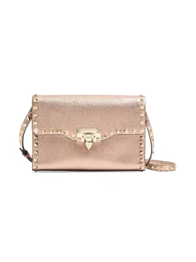 Valentino Garavani Women's Rockstud Small Crossbody Bag in Laminated Grainy Calfskin Leather - Rose Cannelle | Thumbnail 1 Valentino Garavani Women's Rockstud Small Crossbody Bag in Laminated Grainy Calfskin Leather - Rose Cannelle | Thumbnail 1