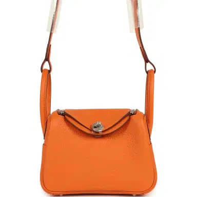 HERMÈS Hermes Mini Lindy II Orange Clemence Palladium Hardware | Thumbnail 1 HERMÈS Hermes Mini Lindy II Orange Clemence Palladium Hardware | Thumbnail 1