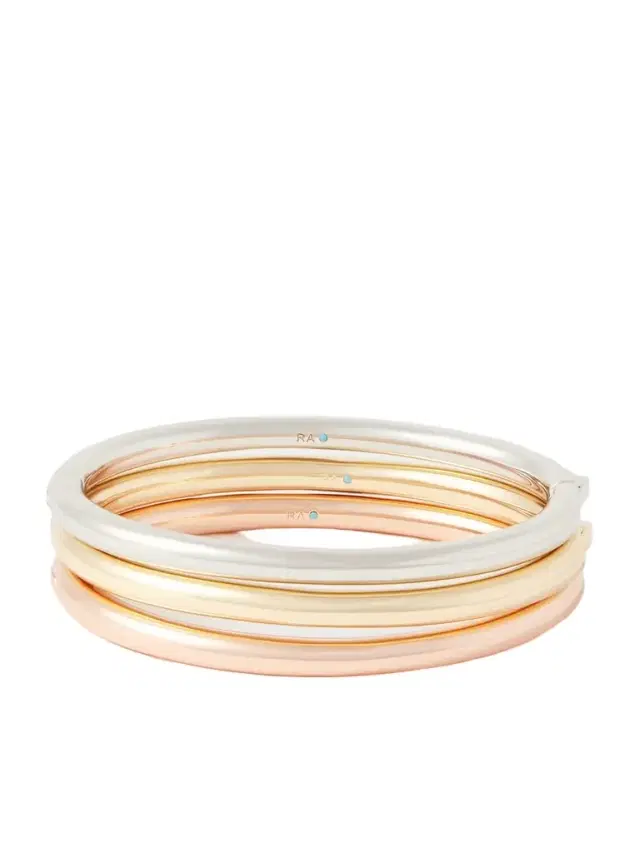 The Tubular Hinged Set Of Three Gold, Rose Gold And Silver-tone Bracelets