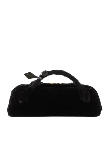 Alaïa Le Teckel Leather-trimmed Shearling Clutch | Thumbnail 1 Alaïa Le Teckel Leather-trimmed Shearling Clutch | Thumbnail 1
